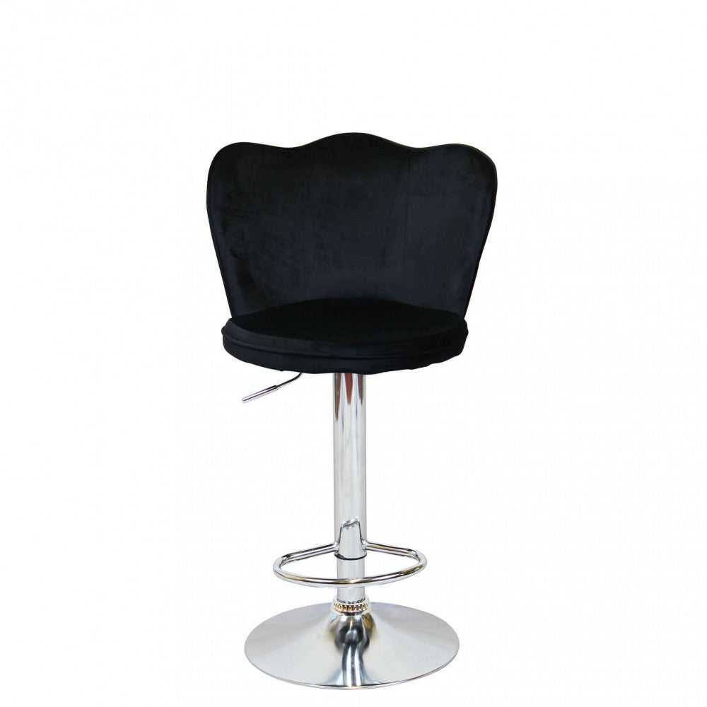 Sgabello Eric in velluto nero, vista frontale su sfondo bianco con riflessi di luce.