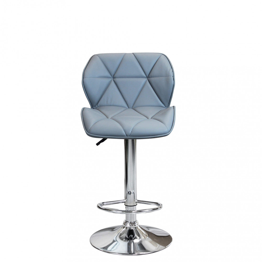 Prospettiva frontale simmetrica dello sgabello Manuel, perfetta sintesi di design moderno e materiali di pregio.
