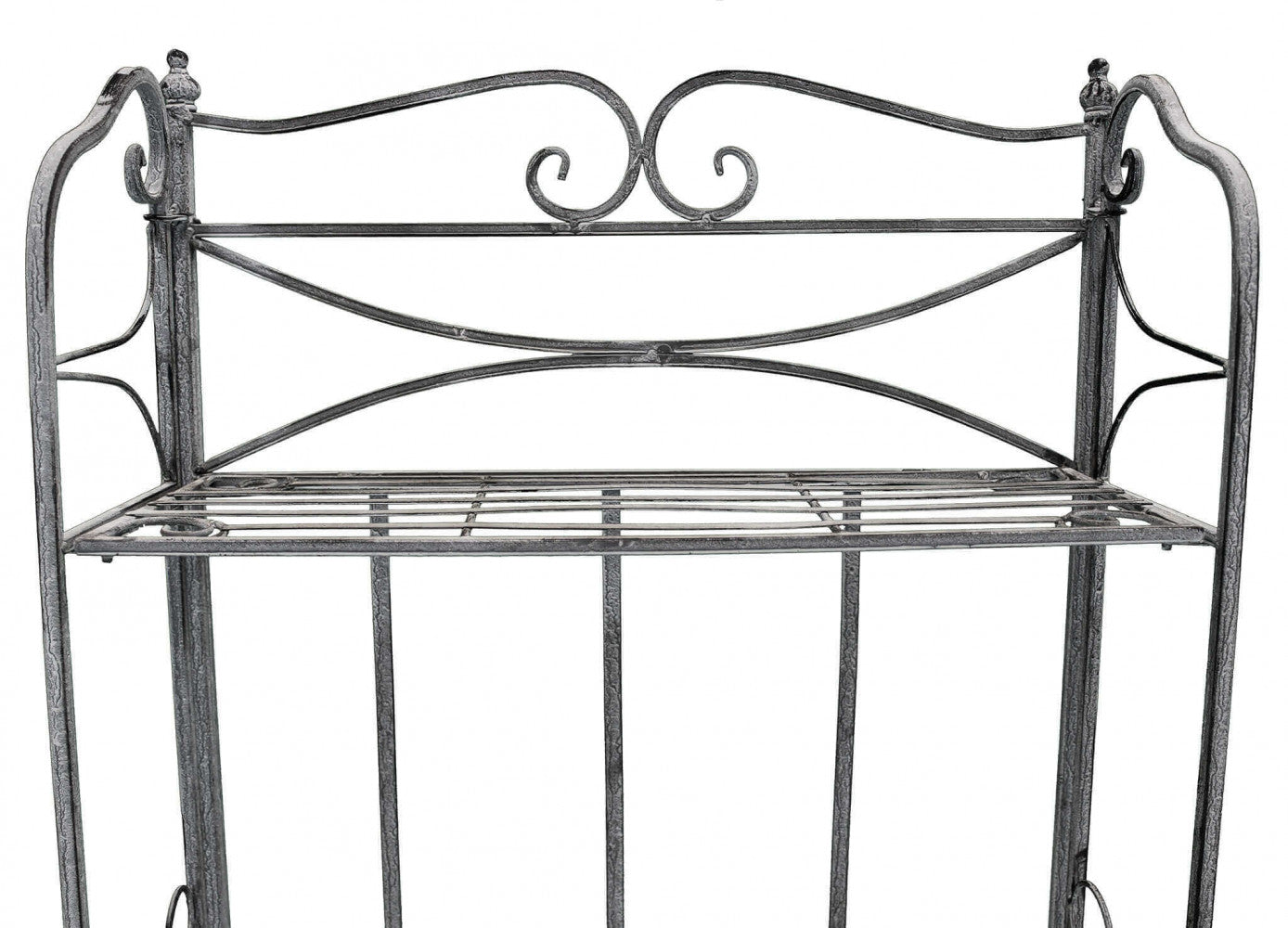 Dettaglio ravvicinato della parte superiore dell'étagère, che mostra le eleganti volute decorative in acciaio e la finitura anticata.