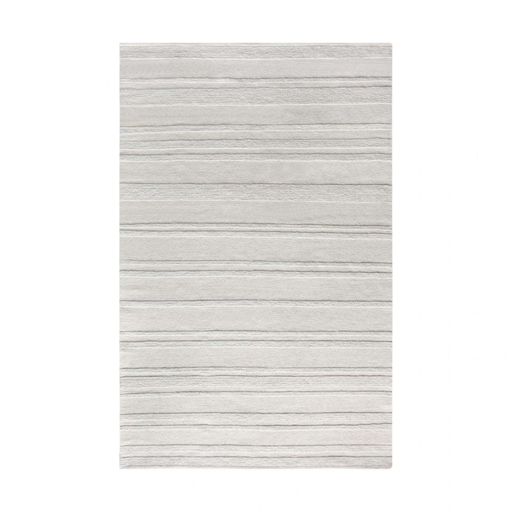 Vista dall'alto del Tappeto Antoine, che mostra il design a righe orizzontali in bianco e beige.