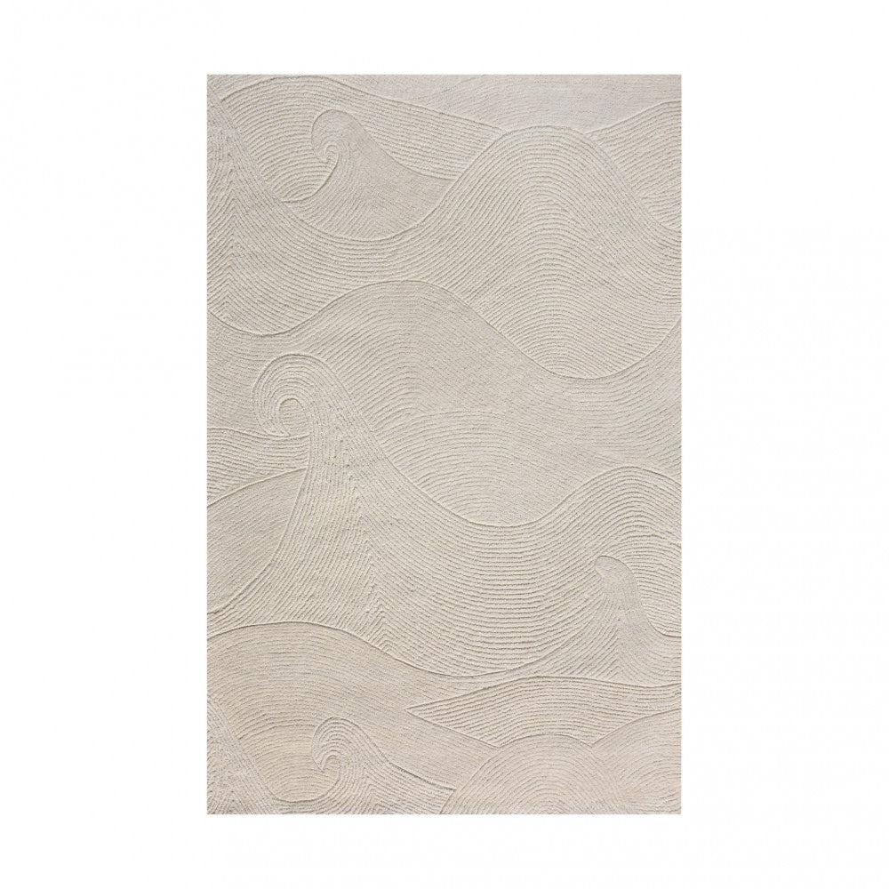 Vista dall'alto del tappeto Grégoire bianco, evidenziando la texture scultorea e la composizione premium.