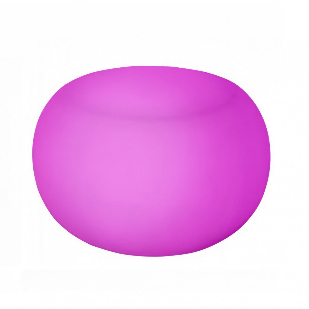Tavolino luminoso Dorado in polietilene rosa isolato su sfondo bianco.