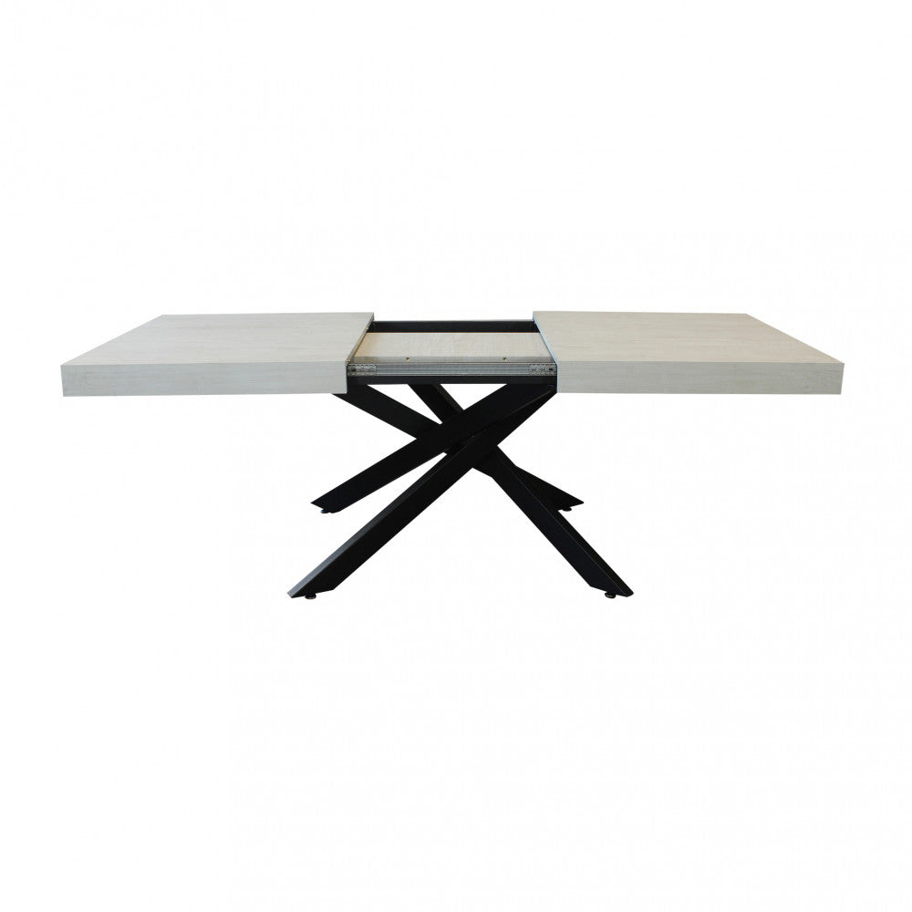 Tavolo completamente esteso a 240 cm con le prolunghe perfettamente allineate.