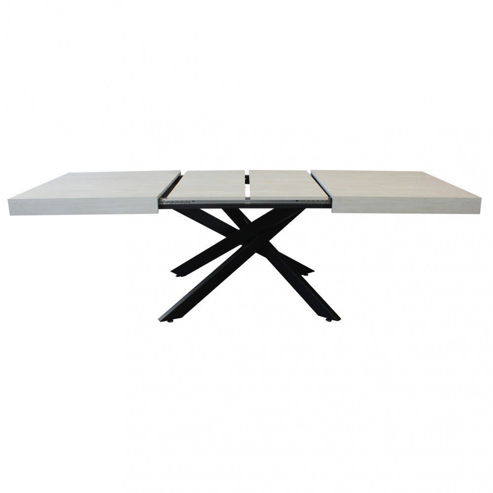 Configurazione intermedia del tavolo che illustra la modularità dello spazio conviviale.