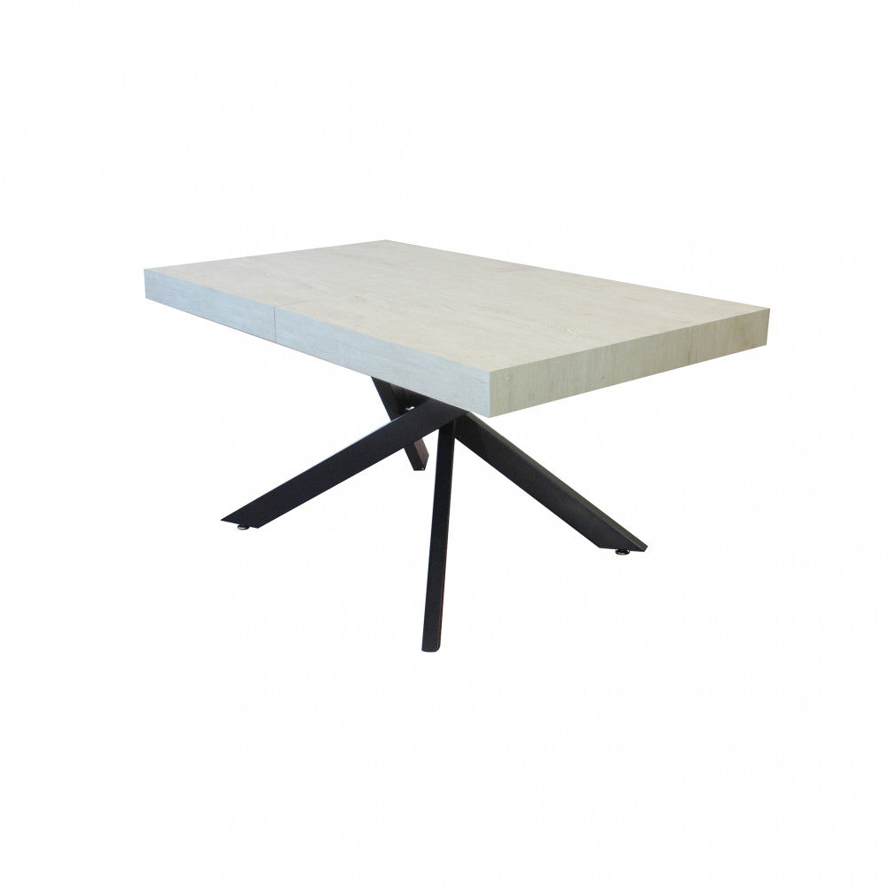 Tavolo da pranzo chiuso nella sua configurazione compatta da 160 cm.