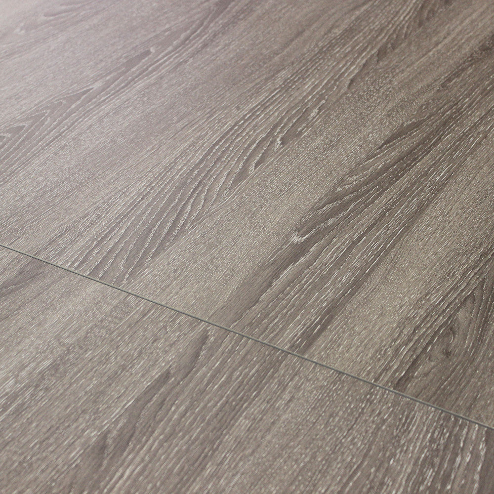 Dettaglio ravvicinato della texture materica in melaminico grigio