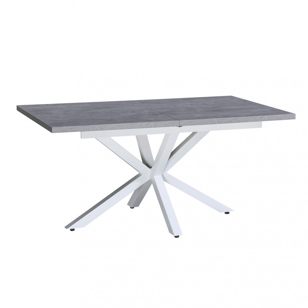 Tavolo da pranzo Garfield in configurazione chiusa da 160 cm, con piano grigio materico e gambe bianche.