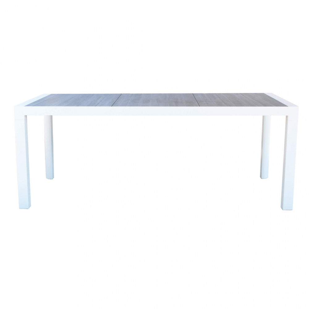 Prospettiva frontale del tavolo da giardino Carson che ne esalta le dimensioni di 195x90 cm e le robuste gambe bianche.