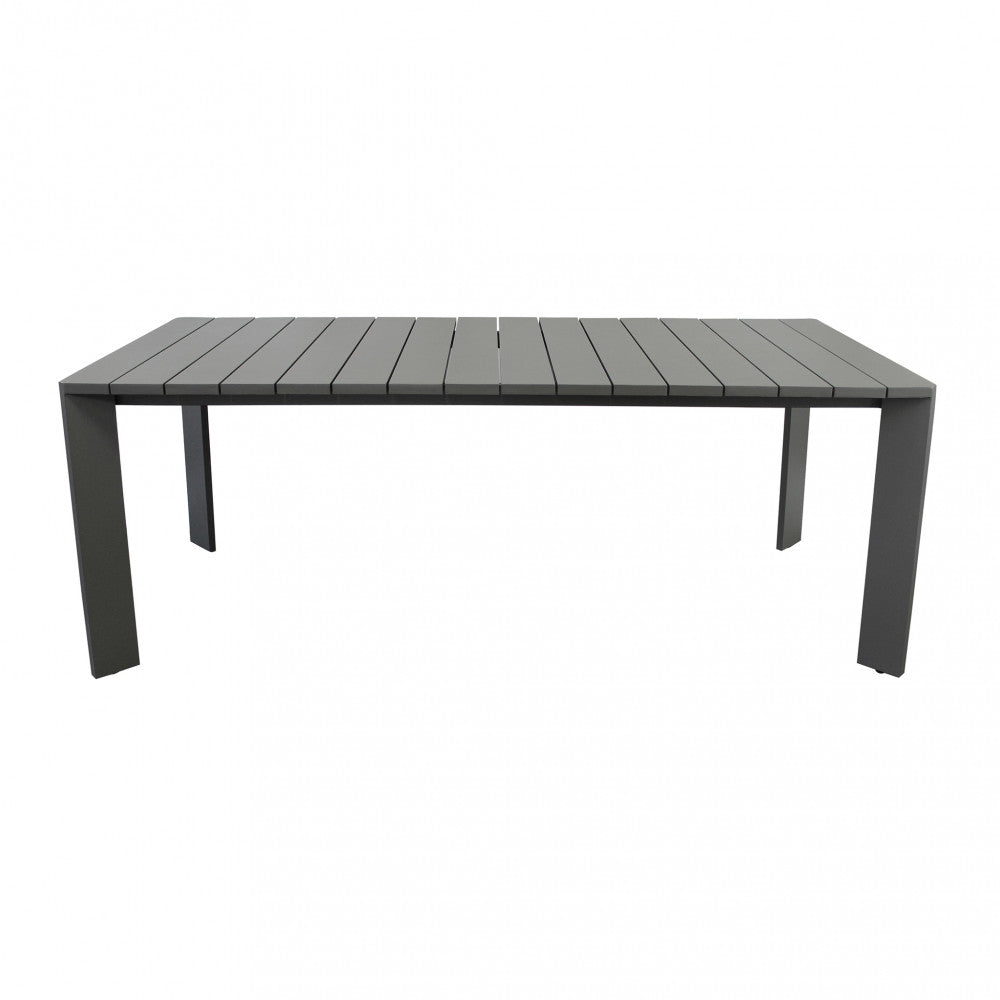 Prospettiva frontale del tavolo da giardino in alluminio dal design lineare e robusto.