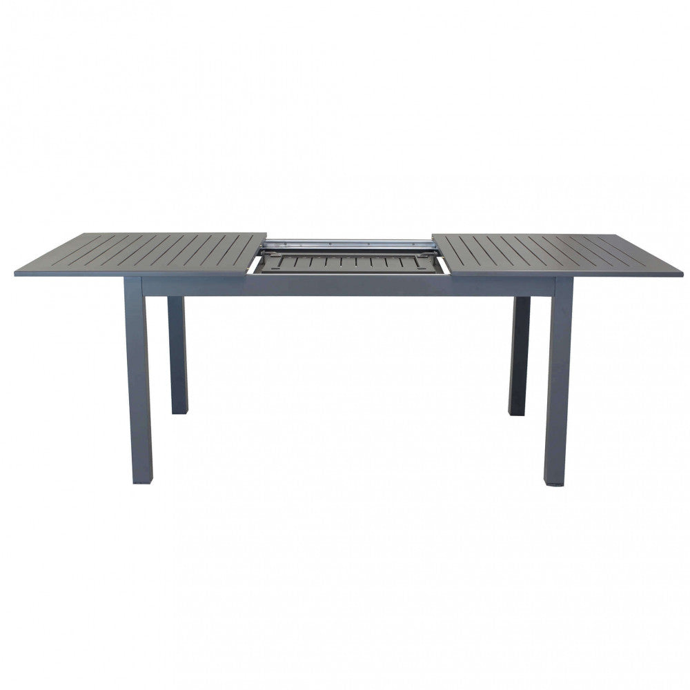 Tavolo Cuba allungato, mostrato in un'ambientazione esterna, che evidenzia la sua funzionalità estensibile e il design pulito | Albert Stock