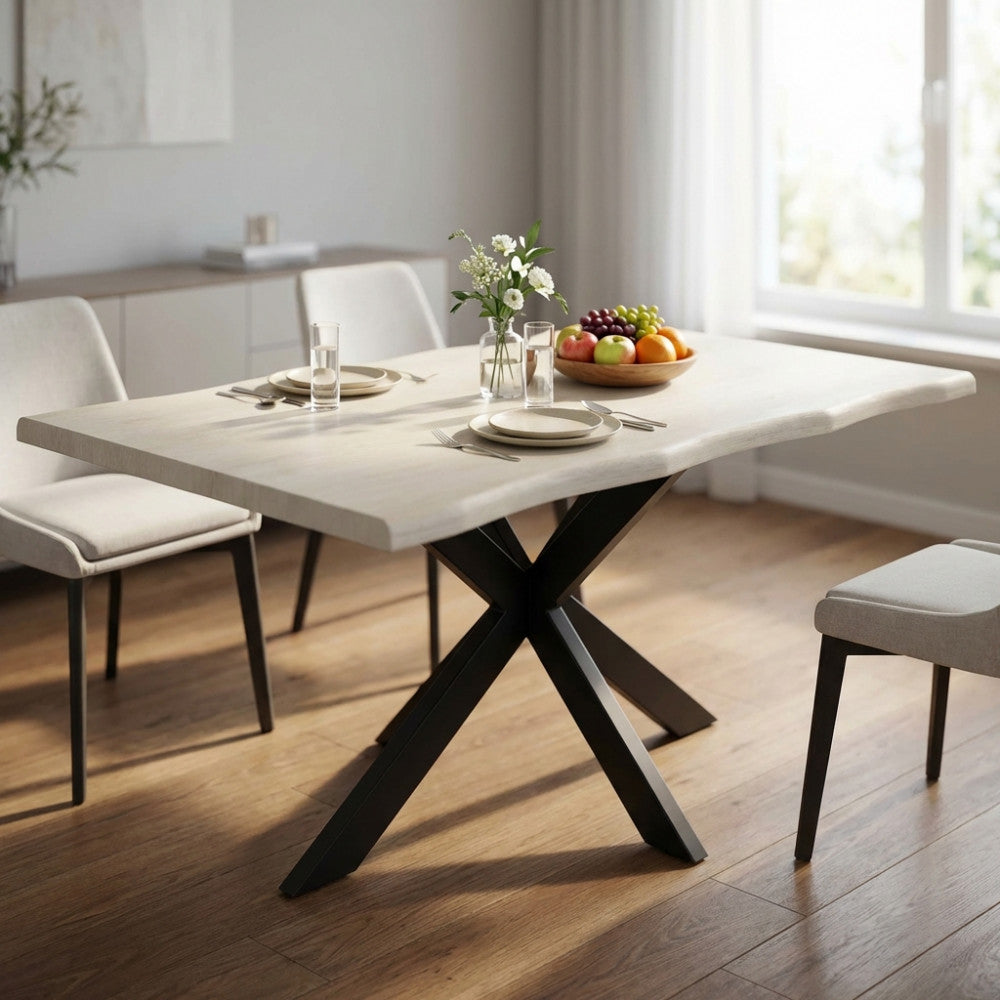 Tavolo da pranzo Floyd in melaminico bianco effetto legno ambientato in una sala da pranzo luminosa.