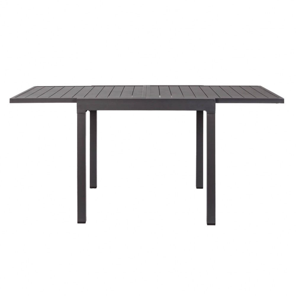 Prospettiva frontale del tavolo Hawaii allungato, che mette in risalto la simmetria e l'eleganza del design minimalista.