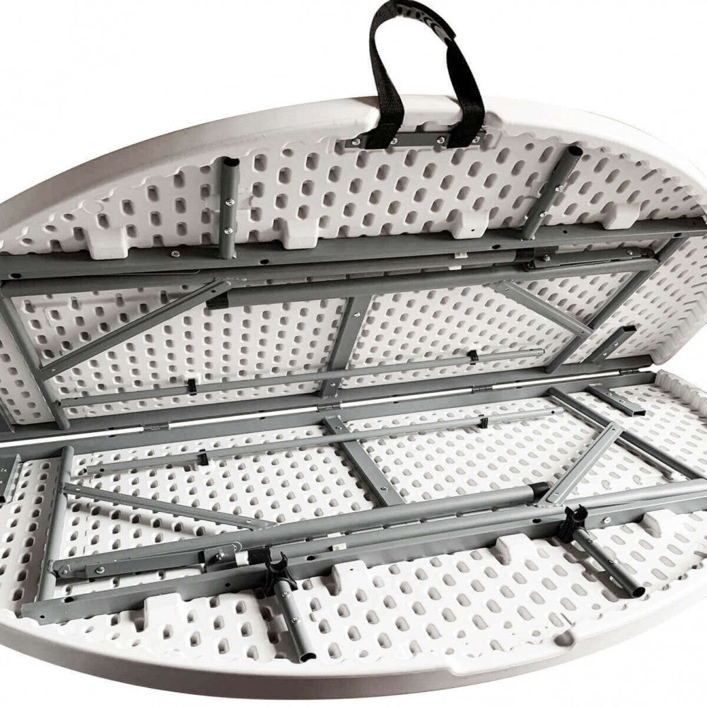 Tavolo pieghevole rotondo, mostrato aperto, con un'ambientazione luminosa che ne evidenzia il piano pulito e la robustezza | Albert Stock