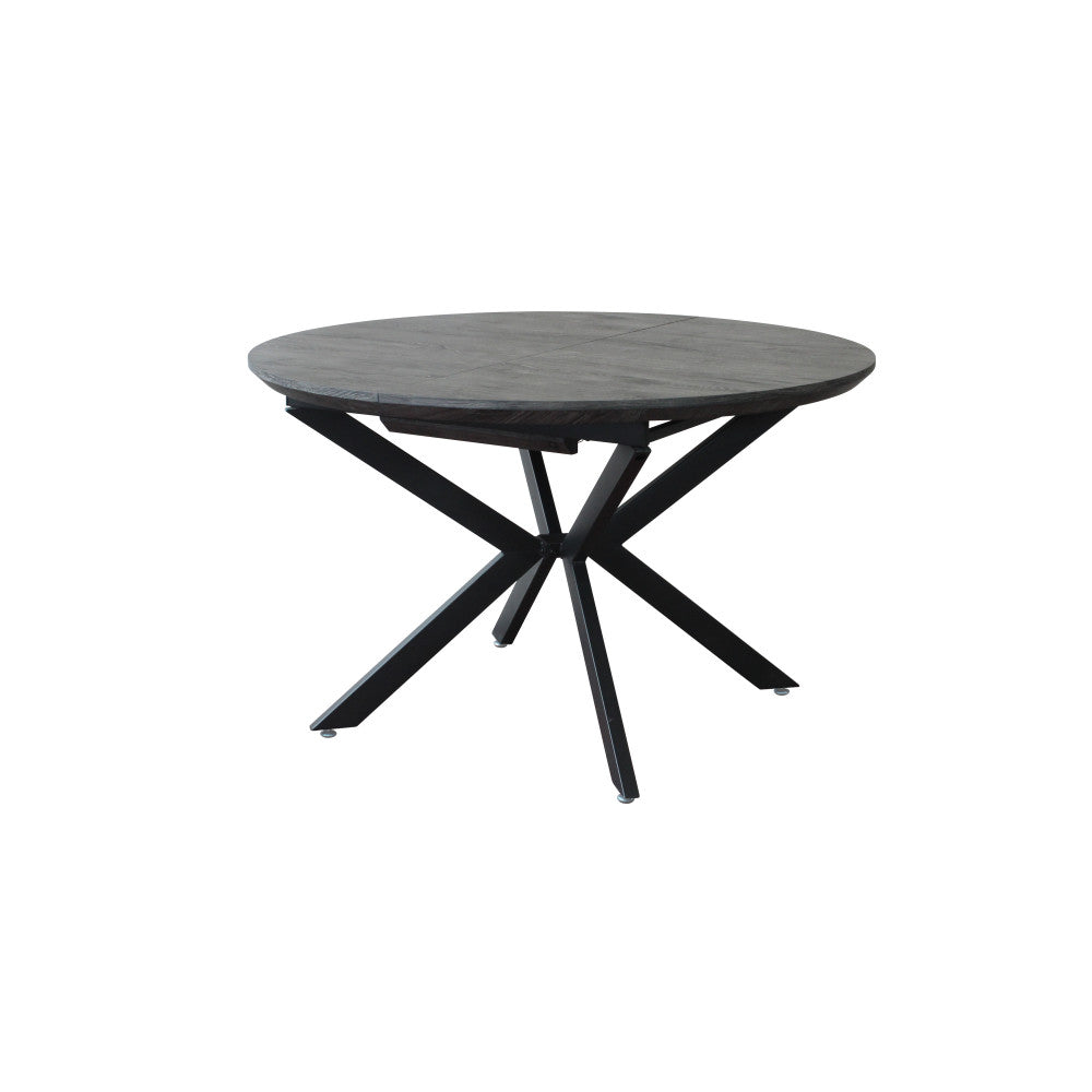 Tavolo Garry nella sua forma rotonda compatta da 120 cm.