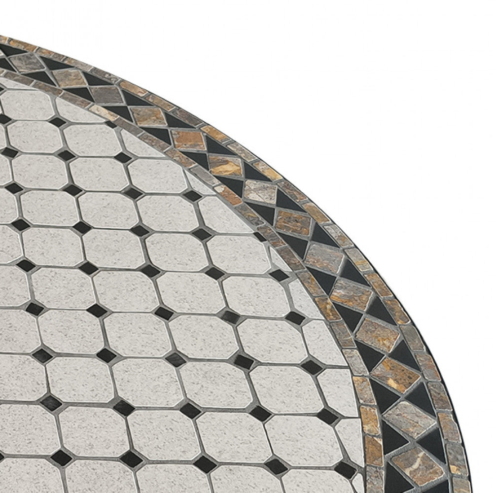 Dettaglio ravvicinato del top in ceramica con motivo ottagonale beige e inserti a rombo neri.