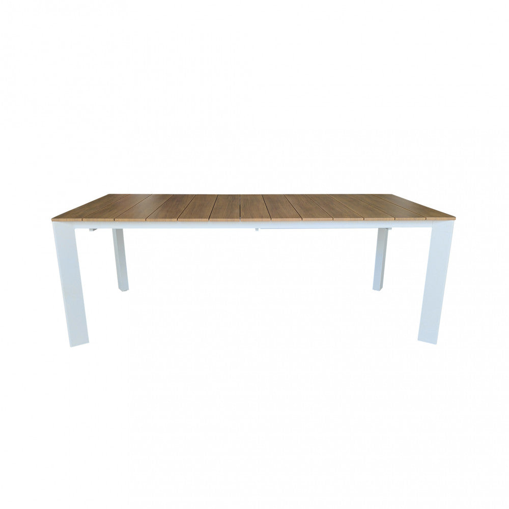 Vista d'insieme del tavolo Sacramento in configurazione standard, che mostra l'equilibrio dei volumi e il design pulito.
