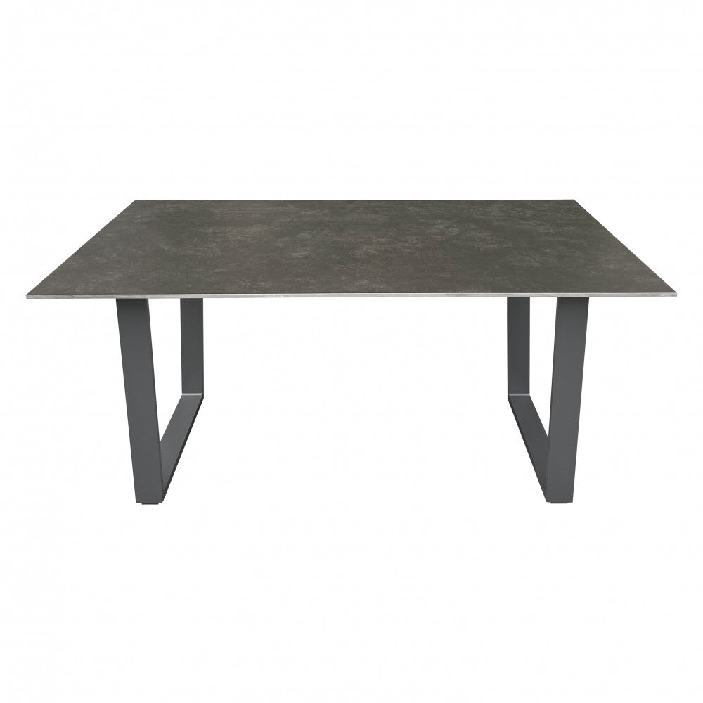 Vista frontale del tavolo Warren 2, dal design moderno e geometrico, con struttura color grigio scuro.