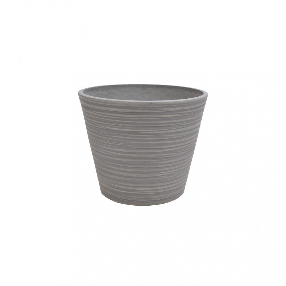 Vista leggermente angolata del Vaso Camelia color antracite su sfondo bianco, mostrando la profondità e la solidità del design architettonico.