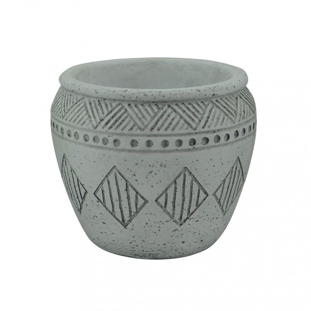 Vaso Girasole vuoto in fibra sintetica grigia, vista frontale che evidenzia le texture a rilievo e i dettagli geometrici su sfondo bianco.