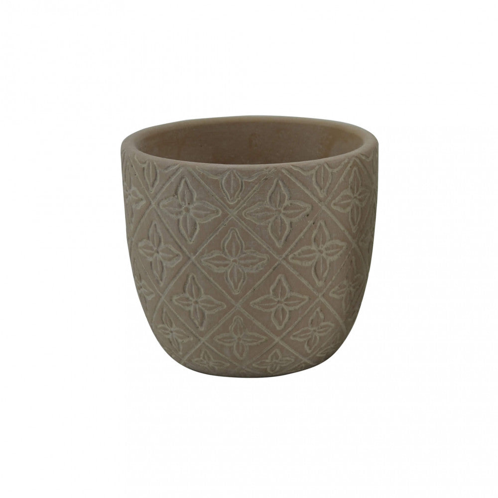 Dettaglio in studio del Vaso Piccolo Pansè vuoto, che mostra il motivo geometrico a rilievo sulla superficie marrone.