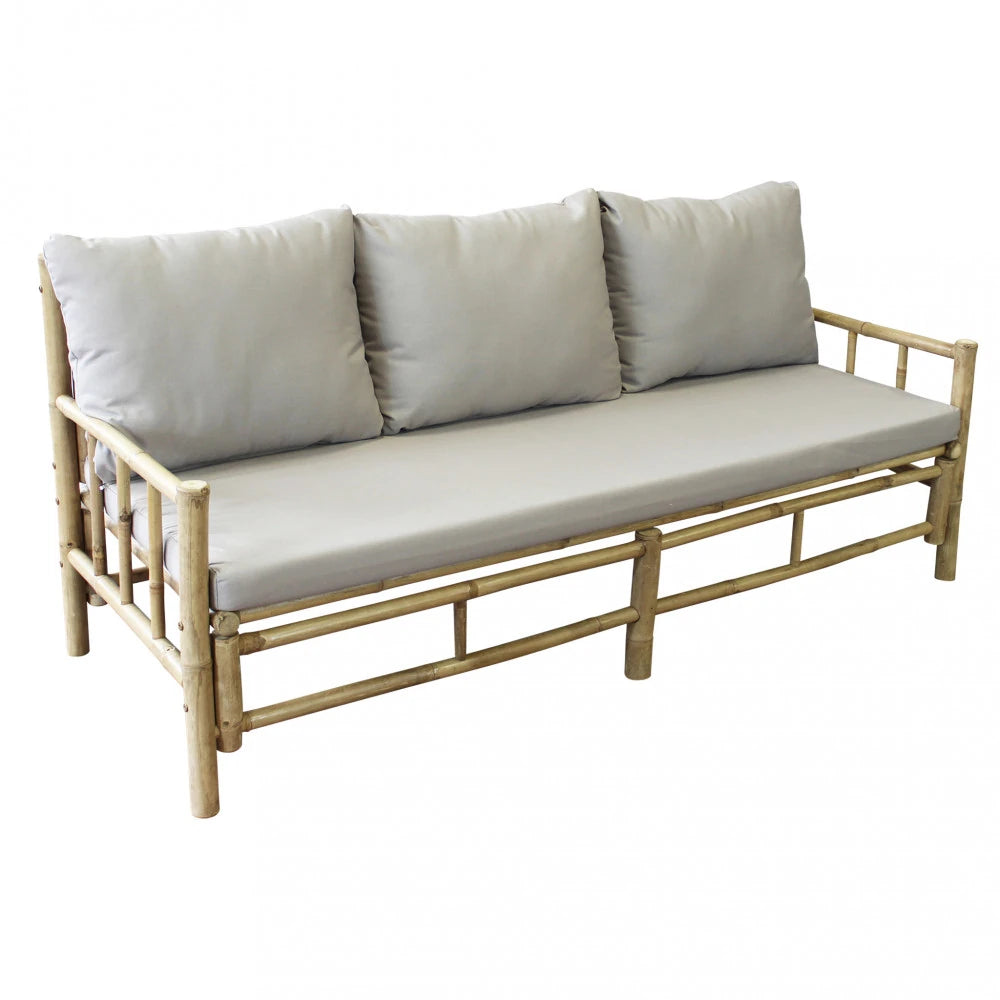 Vista laterale Divano Margarita con struttura in bamboo marrone e cuscino, dal design elegante e multifunzionale