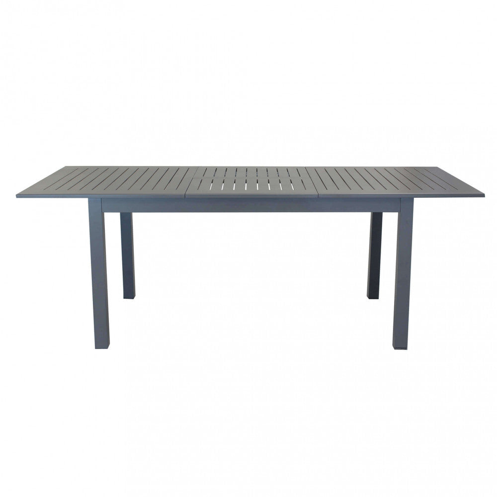 Vista laterale Tavolo Cuba allungato, mostrato in un'ambientazione esterna, che evidenzia la sua funzionalità estensibile e il design pulito | Albert Stock